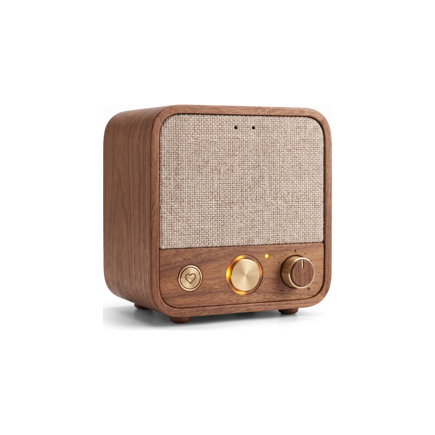 Roomie from a three-quarter angle: a small solid-walnut cabinet with an oatmeal woven cloth grille, a brass heart button, a glowing brass talk button and a brass volume knob.